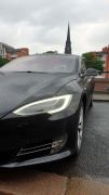 Model S in Hamburg with St.Nikolai Memorial seen in the background